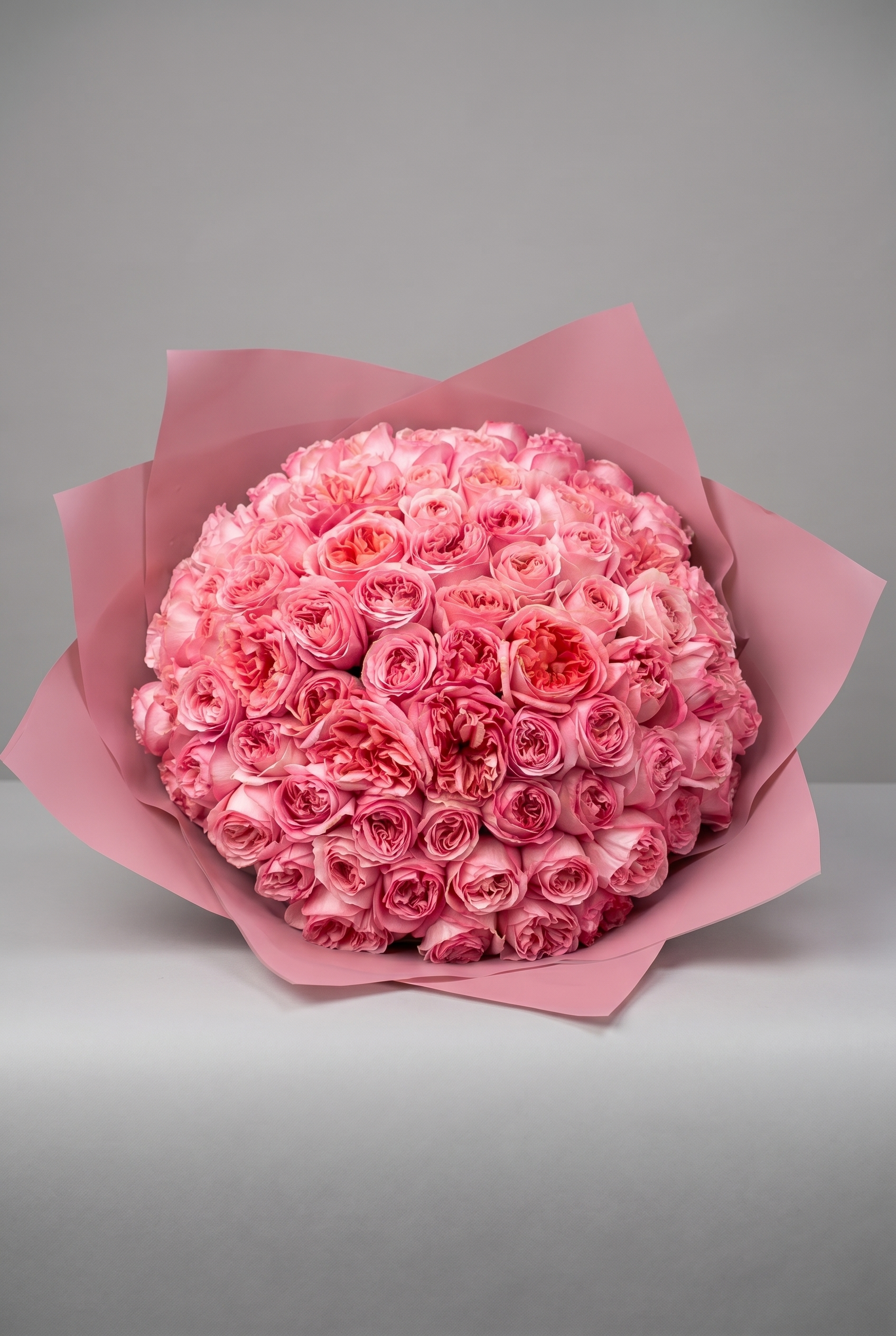 The Connoisseur — luxury hand-tied bouquet of pink garden roses by Petals London