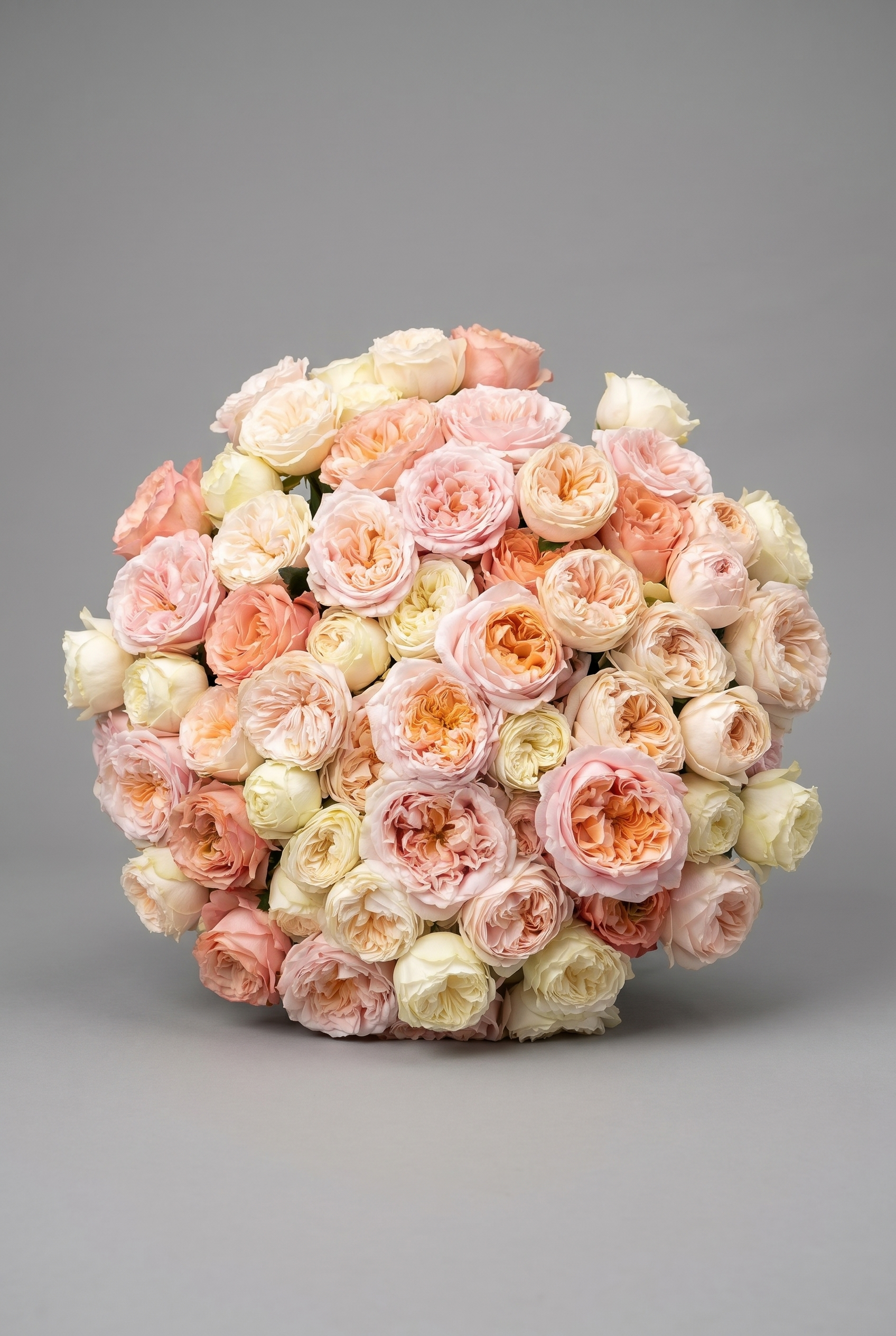 The Bespoke — luxury hand-tied peach and cream ombré garden rose bouquet by Petals London